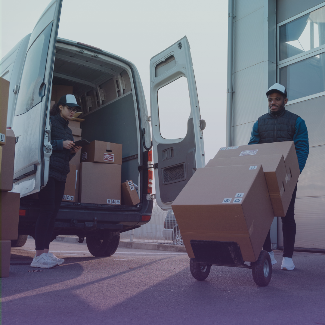 Under "A COMMITMENT TO EFFICIENT DISTRIBUTION": Two delivery workers, a woman with a tablet and a man pushing a hand truck loaded with brown boxes, efficiently load a white delivery van with its rear doors open, showcasing streamlined medical supply distribution practices.
