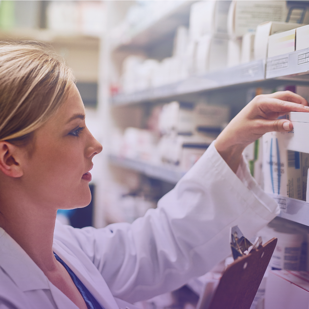 A medical professional in a lab coat reaches for products on a medical supply shelf, symbolizing precision and regulatory compliance.