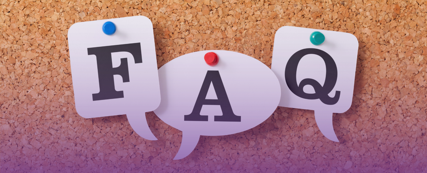 "FAQ" on paper speech bubbles pinned to a cork board, symbolizing frequently asked questions.