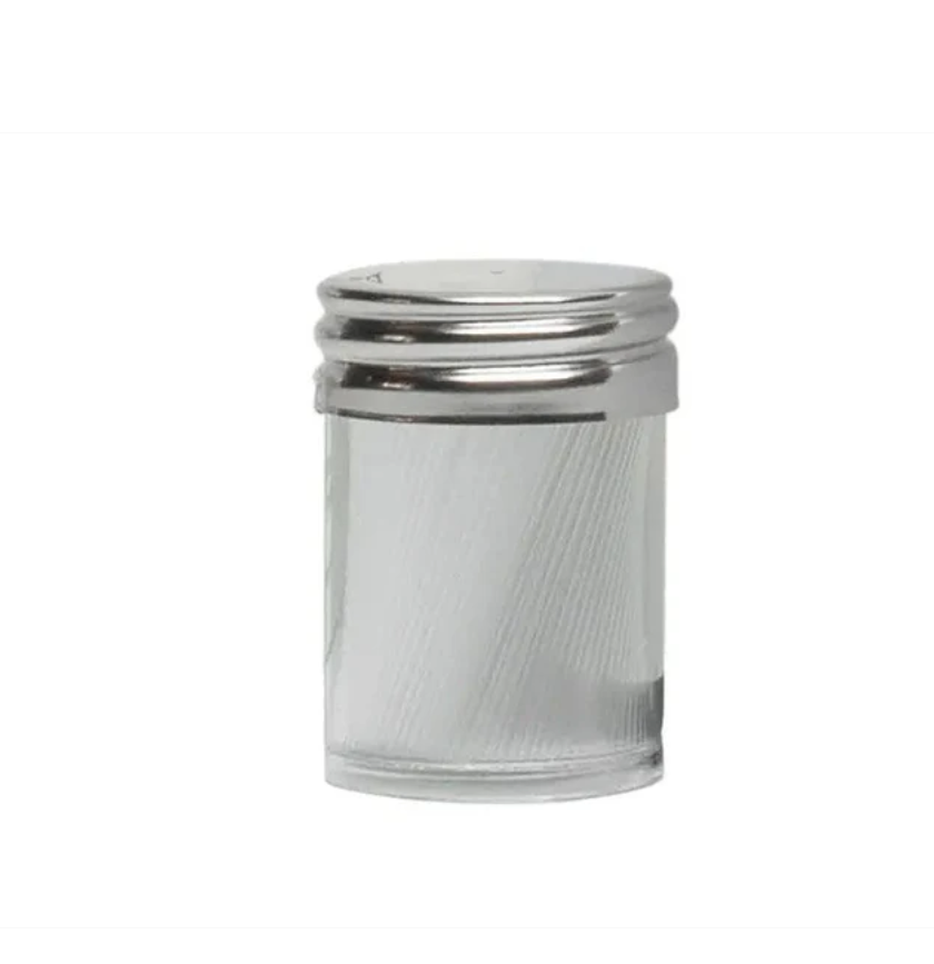 Clear glass jar with metal lid on a white background