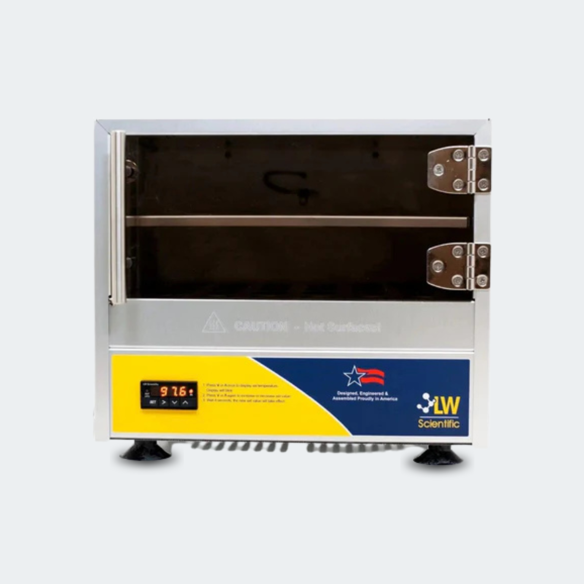 An industrial countertop oven or convection oven with a stainless steel exterior, digital temperature display on the front, and a yellow and blue control panel featuring the LW Scientific logo.