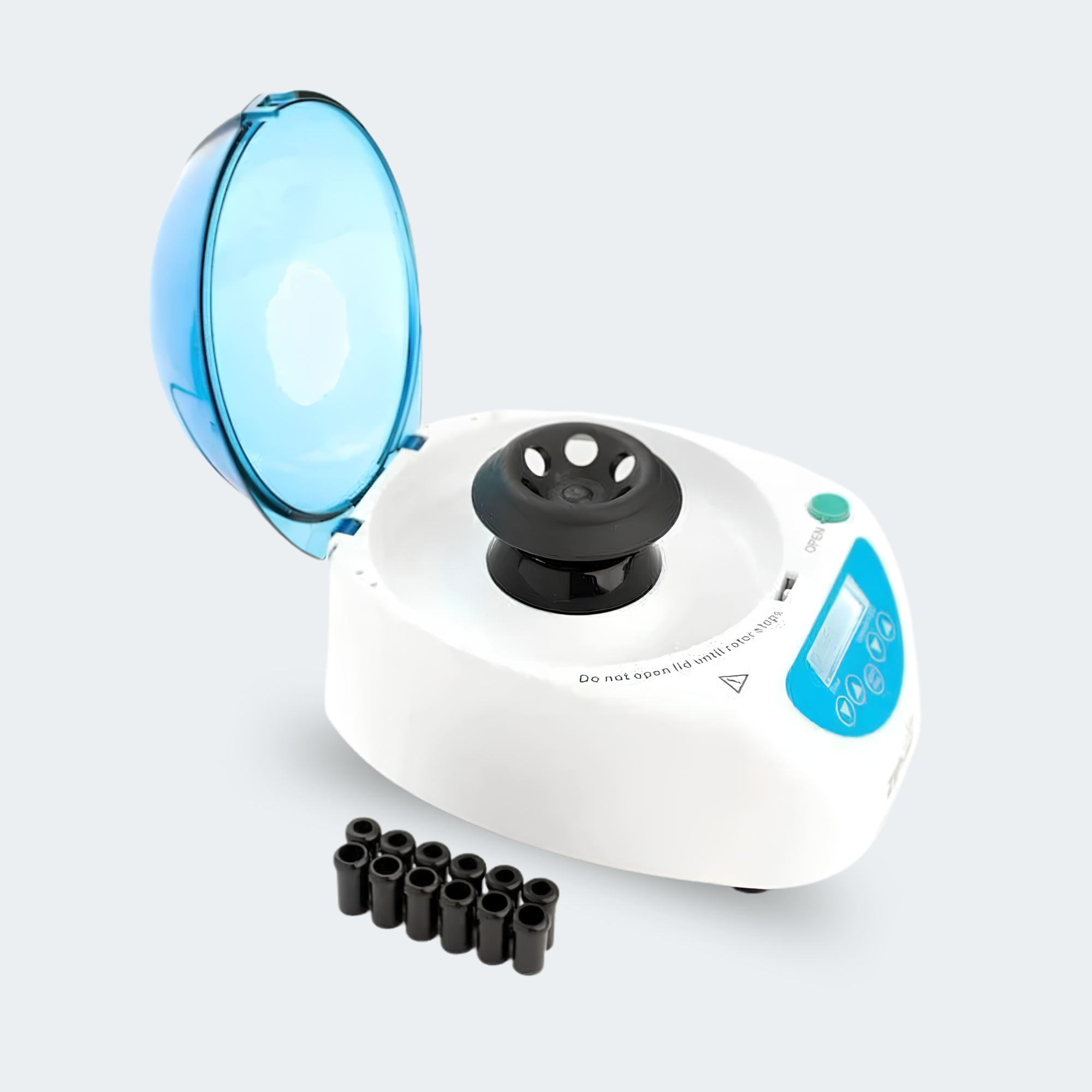 A white centrifuge machine with a translucent blue lid and a black central hub, shown on a light gray background with several black accessories placed in front.