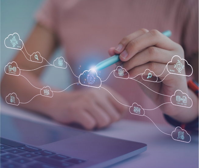 Hands interacting with a glowing holographic network of cloud computing icons and data symbols, with a laptop in the foreground, representing digital integration and cloud solutions.